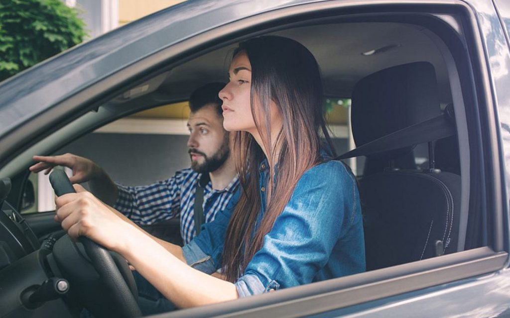 A man training similar to car driving classes Sharjah