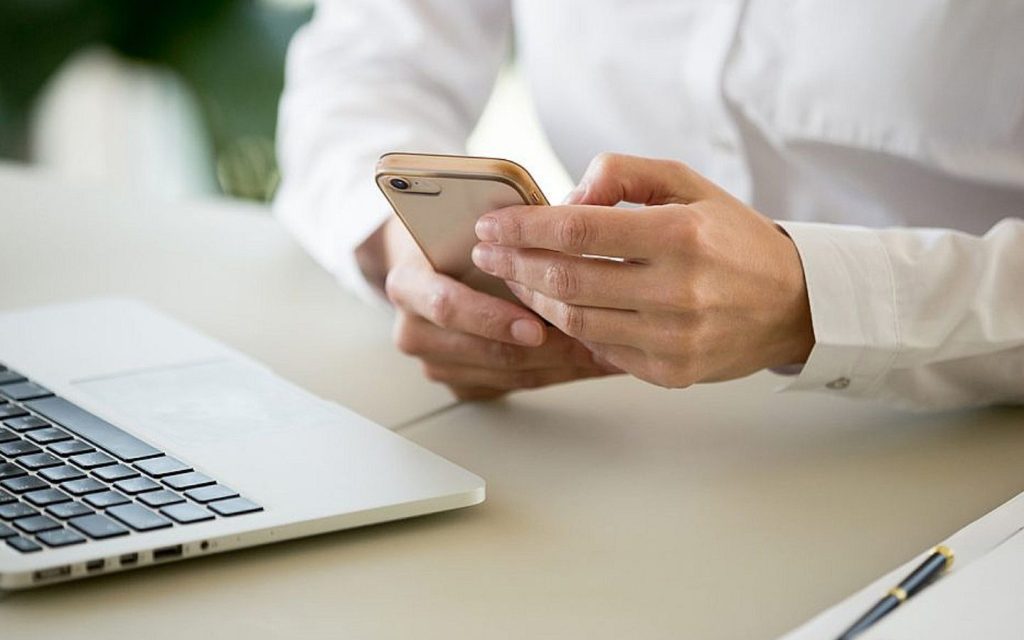 man checking his phone