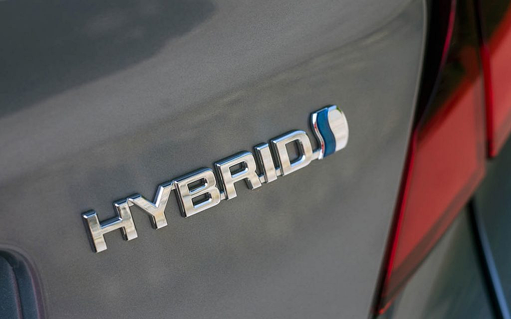Grey Toyota hybrid car logo