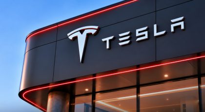 Tesla logo on a grey board