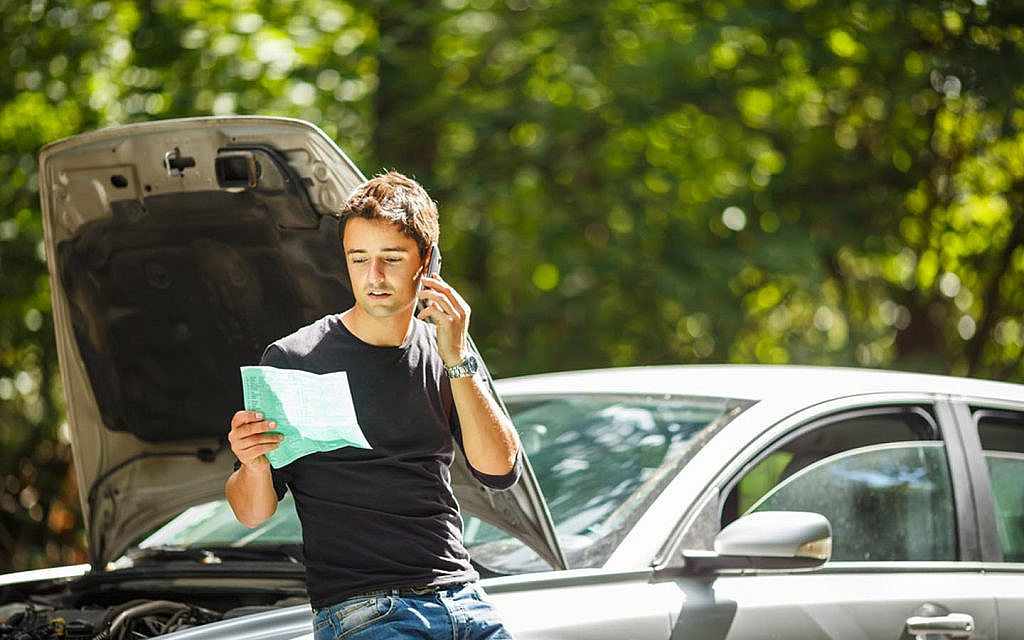 A man is calling for off-road assistance after the car breakdown