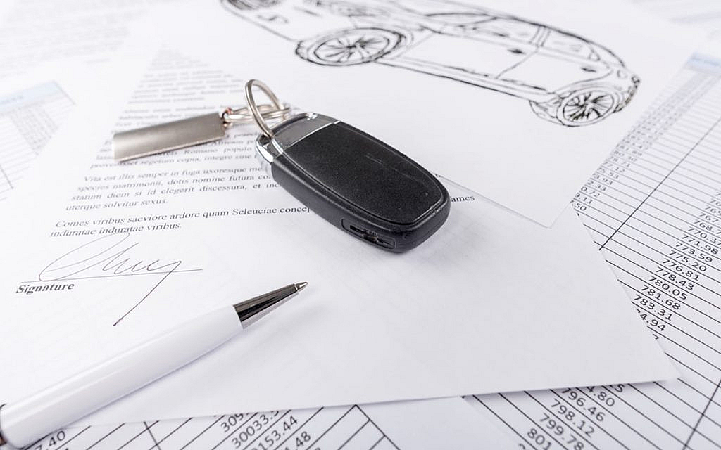 Car keys and documents on the table