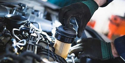 Mechanic changing a car's oil filter