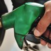 man refueling his car