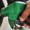 Man adding fuel in his car