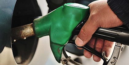 Man adding fuel in his car