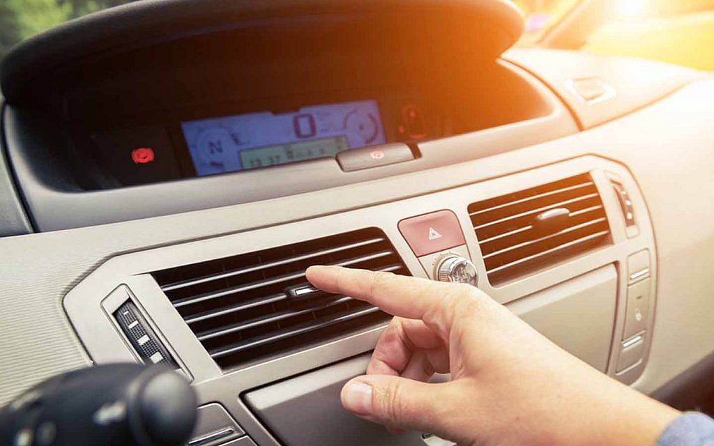 Man fixing air vent grille 