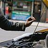 man checking engine