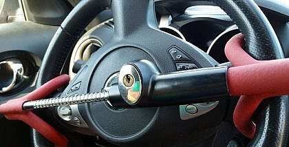 An anti-theft steering wheel lock clipped on steering for safety