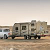 Driving caravan in desert