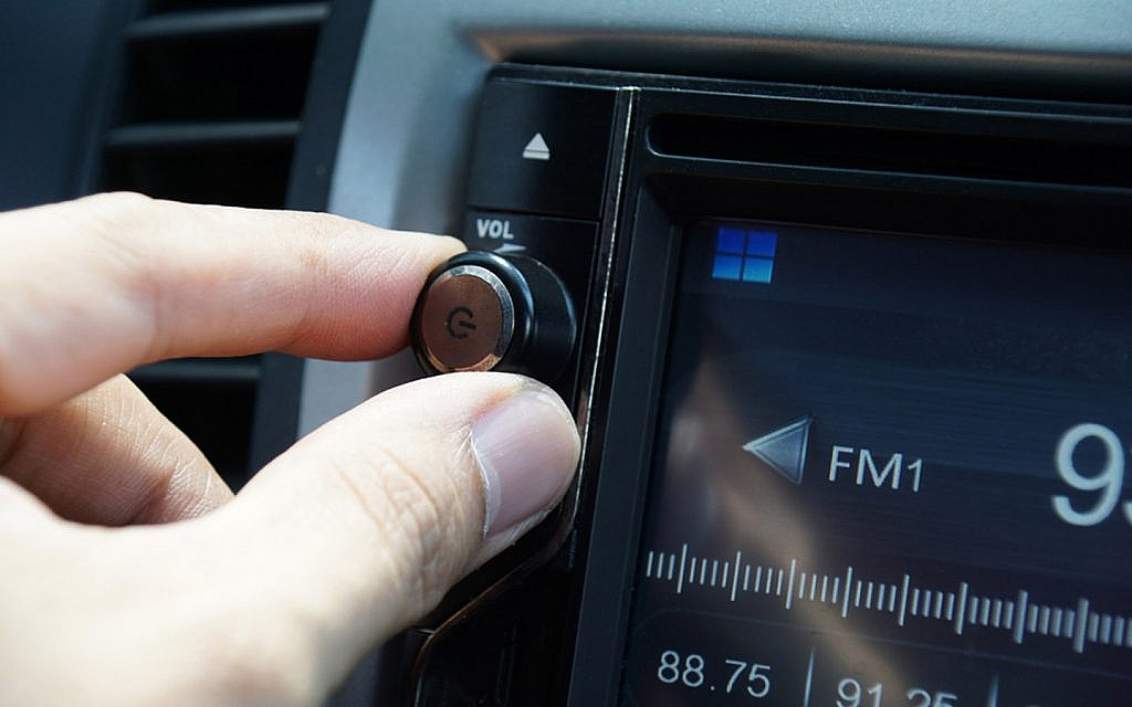 Adjusting volume on a car radio