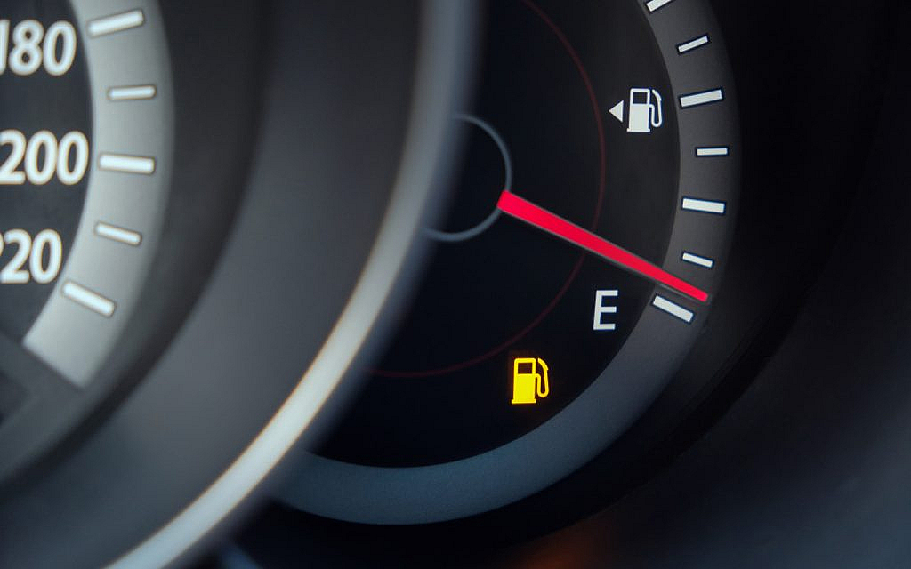 Fuel gauge indicating low fuel tank