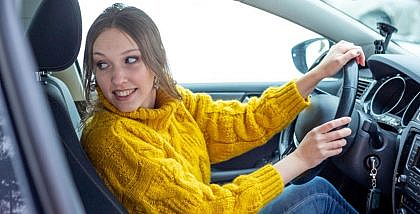 Woman parallel parking her car