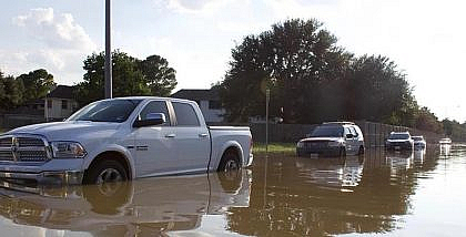 Cars submerged in flood water