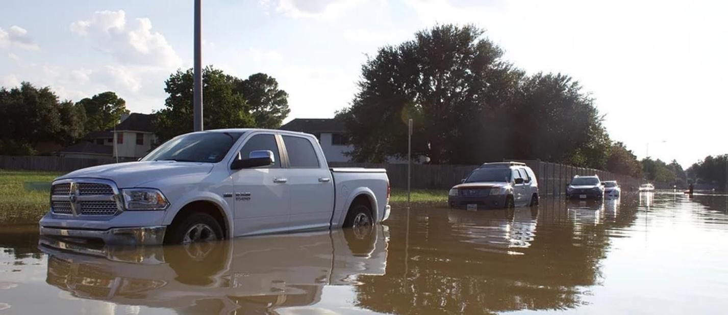 Cars submerged in flood water