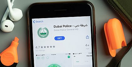 Dubai police smart app logo on a phone