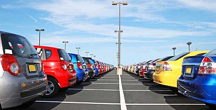 Various cars parked at the dealer shop
