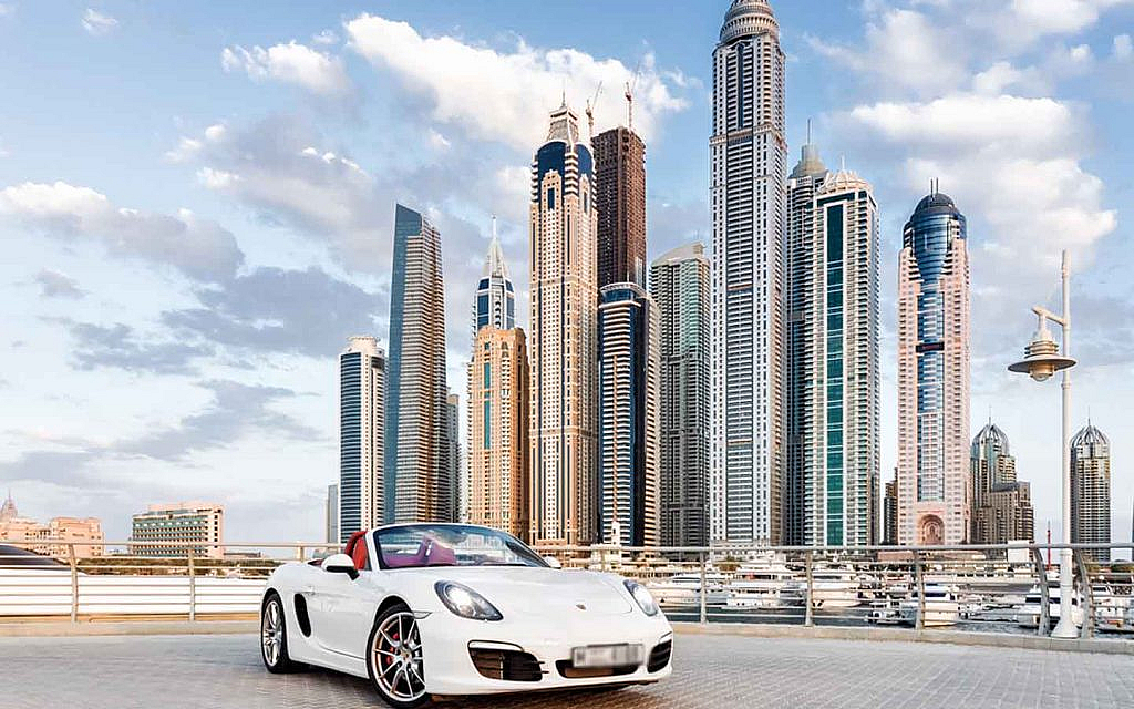White Porsche Cayman in Dubai
