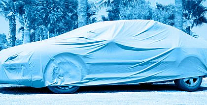 Parked car covered with a best car cover