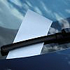 Traffic fine ticket on windshield of a car