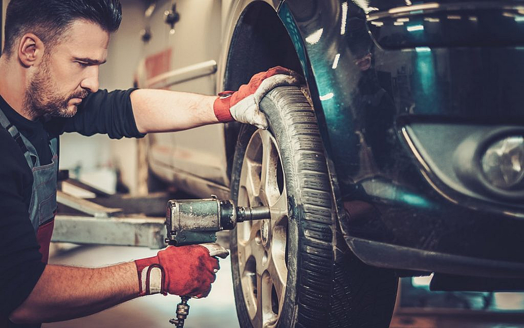 A person analyzing fitness of the car 