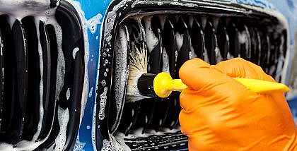 cleaning a blue car