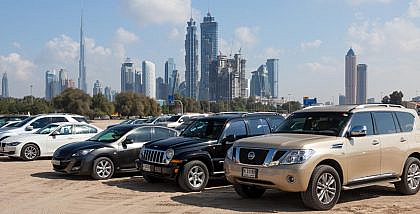 Several cars parked in a parking lot