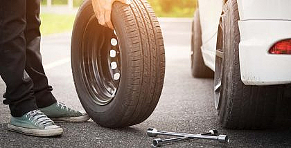 You can change a tire manually if you have car tire changing tool kit