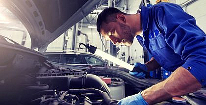 A man busy at engine inspection