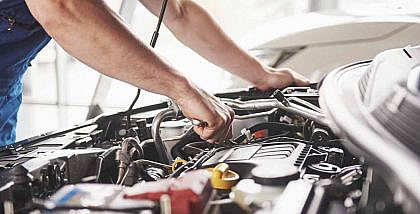 A man repairing a car