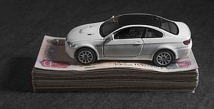 Dinky car on Dirham notes