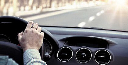 Driving a car on an empty road