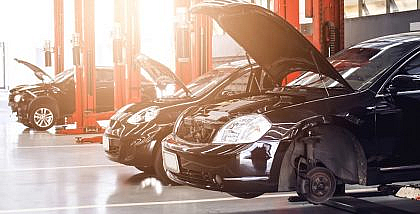 cars parked on the car repair shop