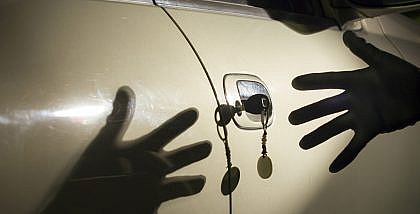 car thief at a parking lot