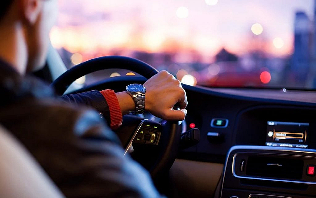 Man driving his vehicle