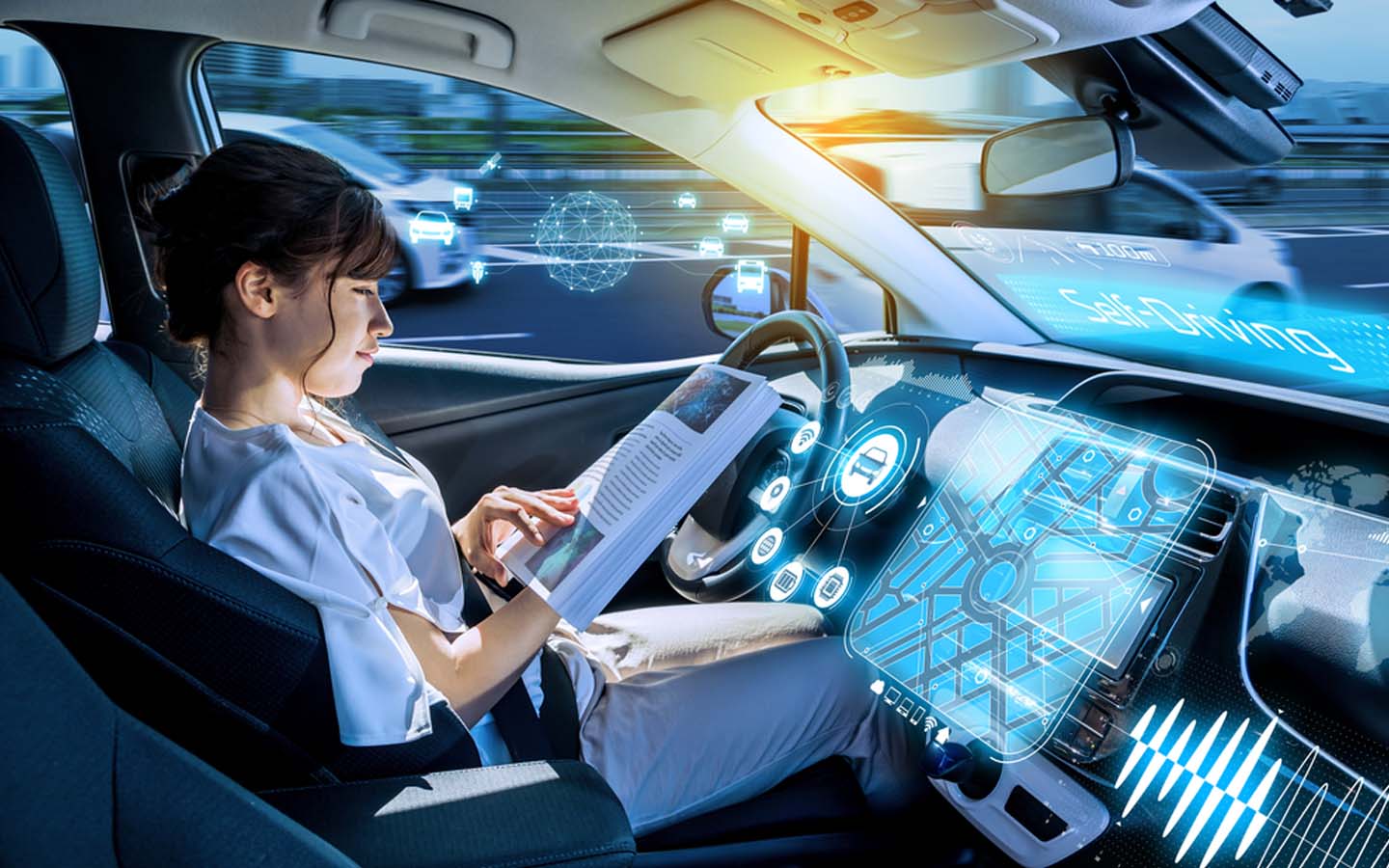 Young woman reading in an autonomous vehicle