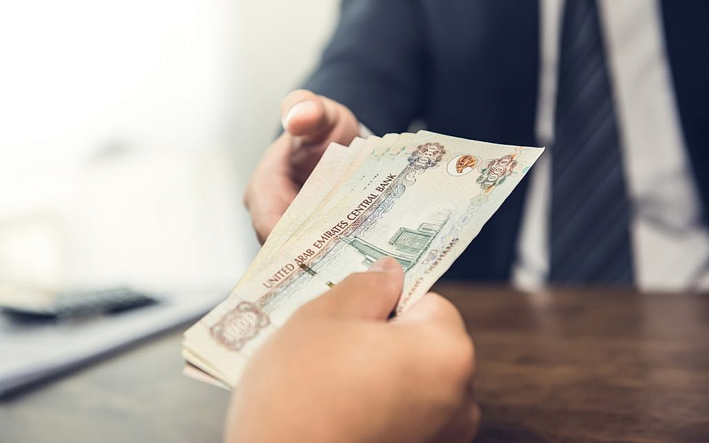 Man taking cash from a customer