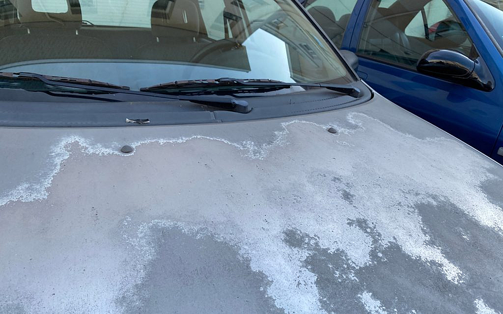 Car body damaged by acid rain