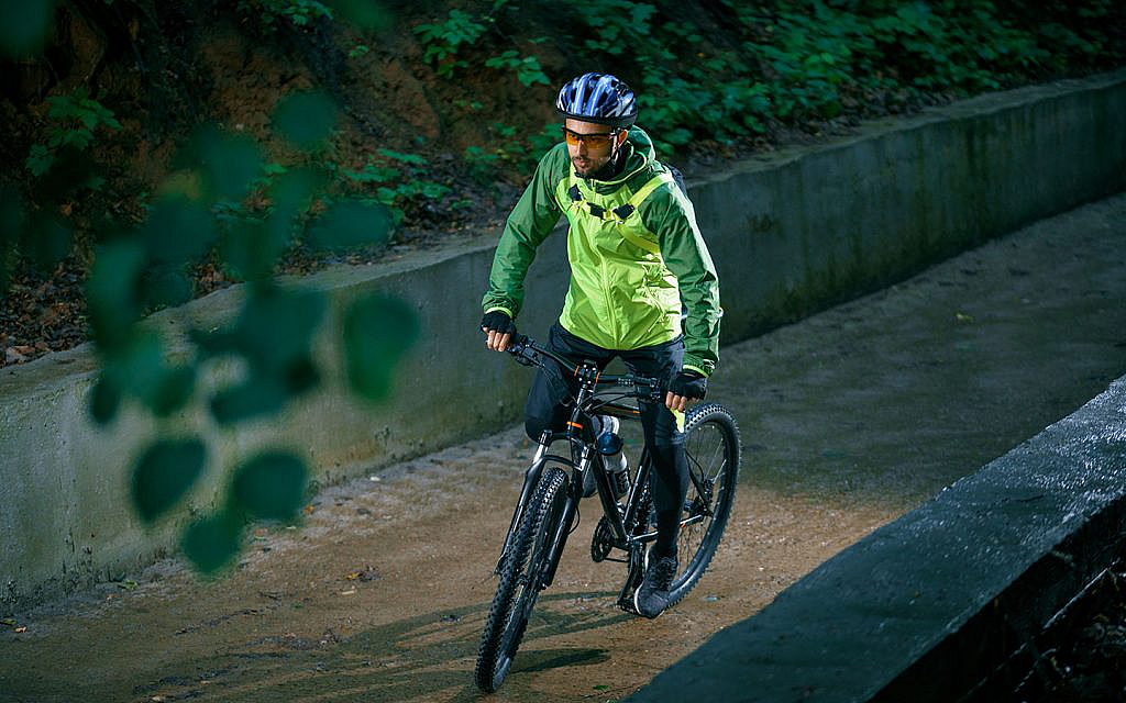 Biker in a reflective vest at night