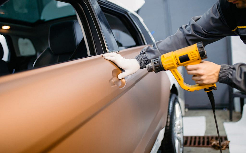 heat gun for smooth application of vinyl wrap