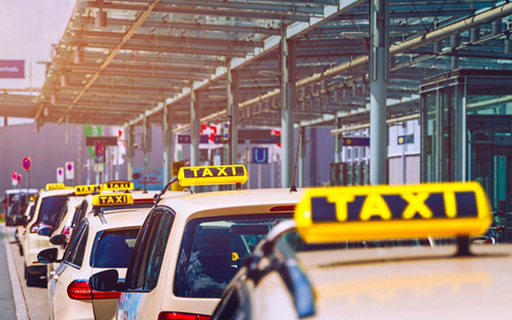 numerous taxis waiting