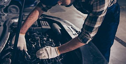 Person is checking damaged engine mount
