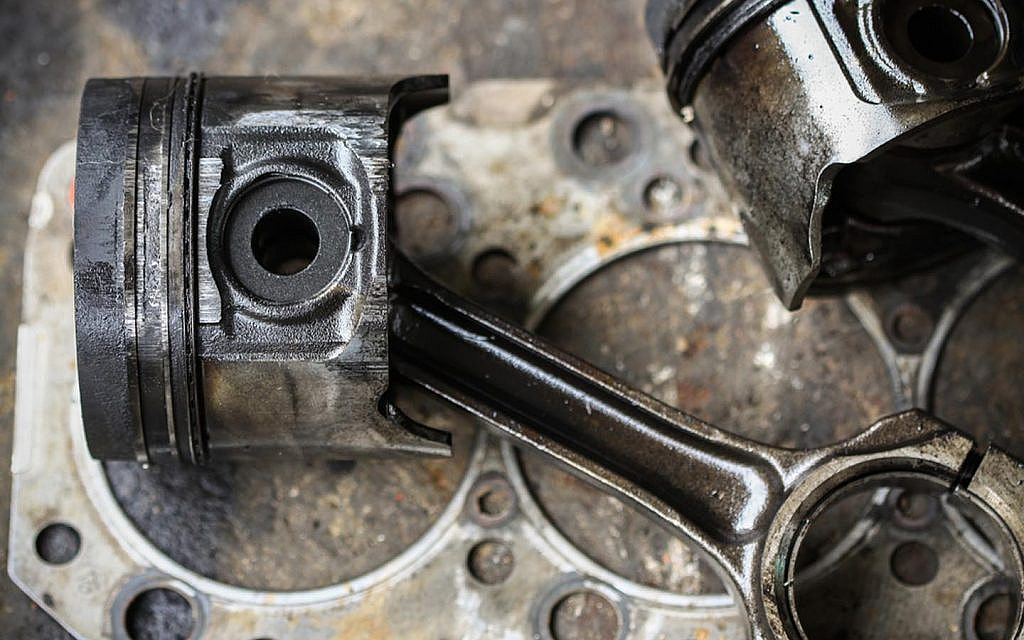 All About Piston Damage Symptoms, Causes & Repair