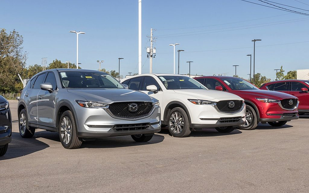 Mazda Cars parked in front of the showroom