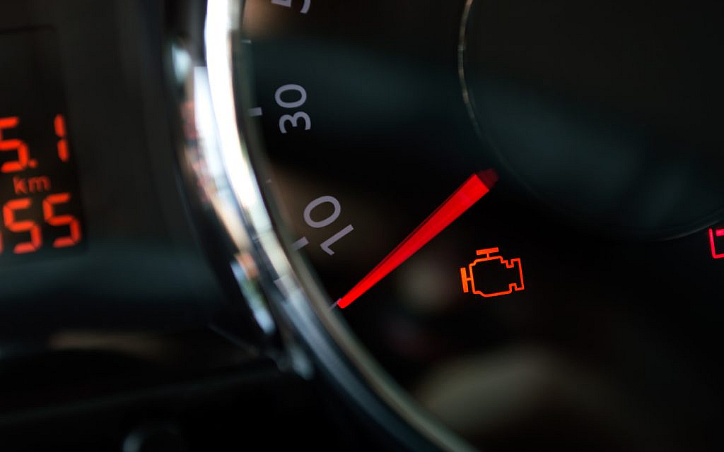 check engine light on indicating a problem 