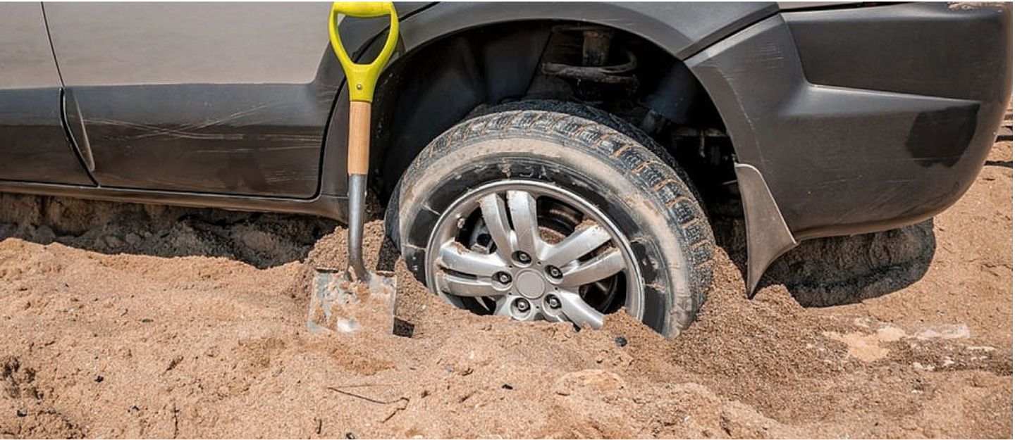 tire stuck in sand