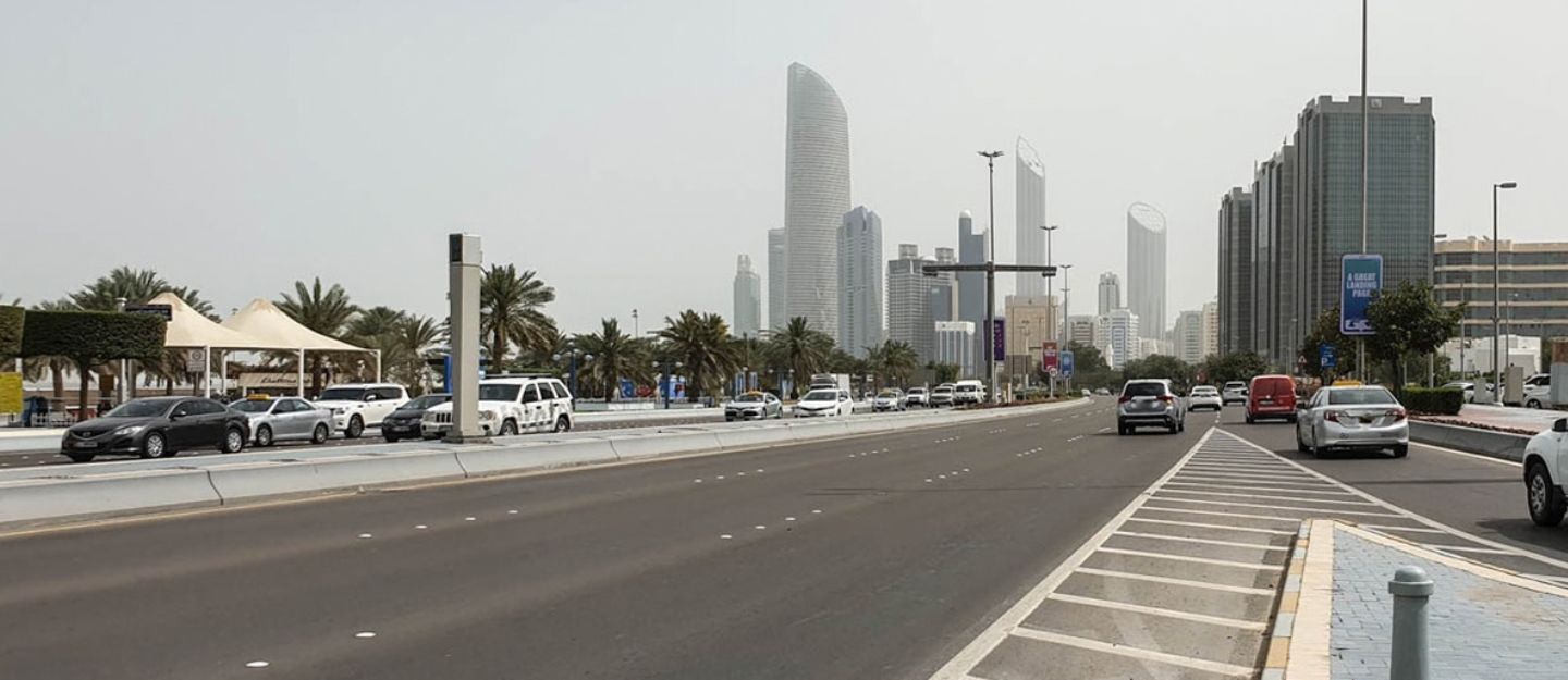 Abu Dhabi main road with skyscrapers in background