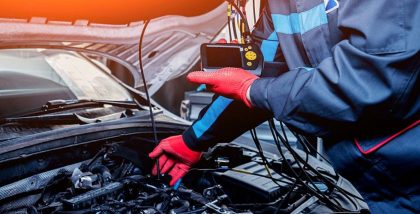 a man is taking car diagnostic test