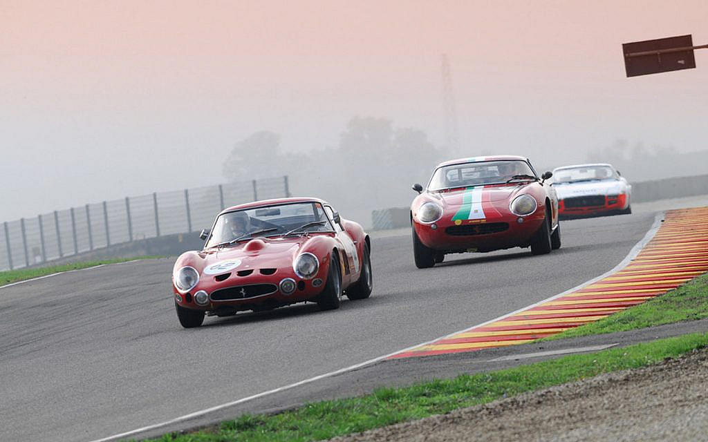 Rare Ferrari cars. An old Ferrari 250 GTO rare car running on a race circuit 