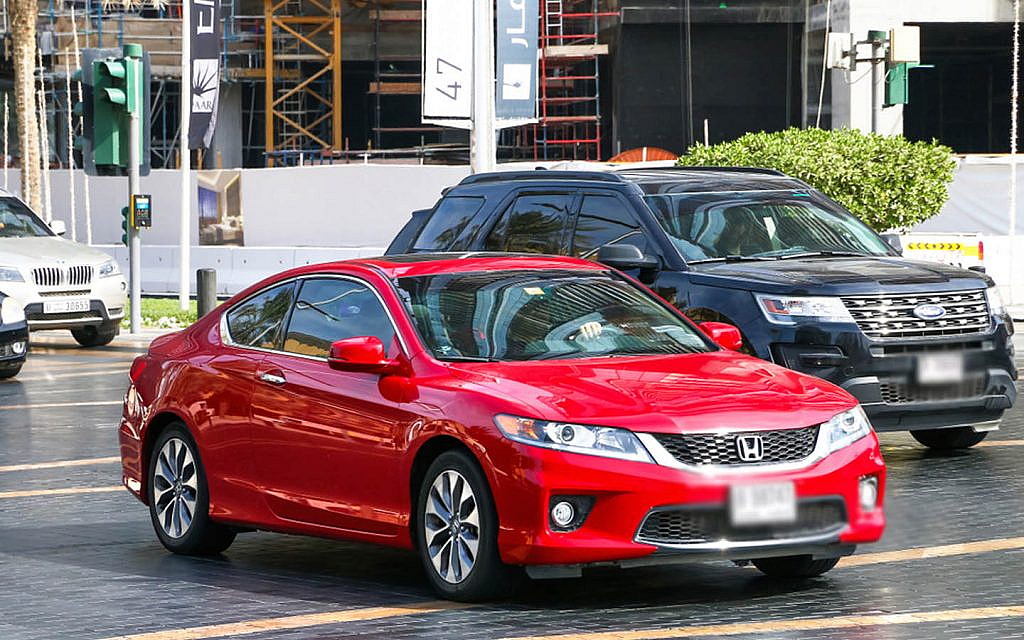 Honda Accord parked on a traffic signal in Dubai